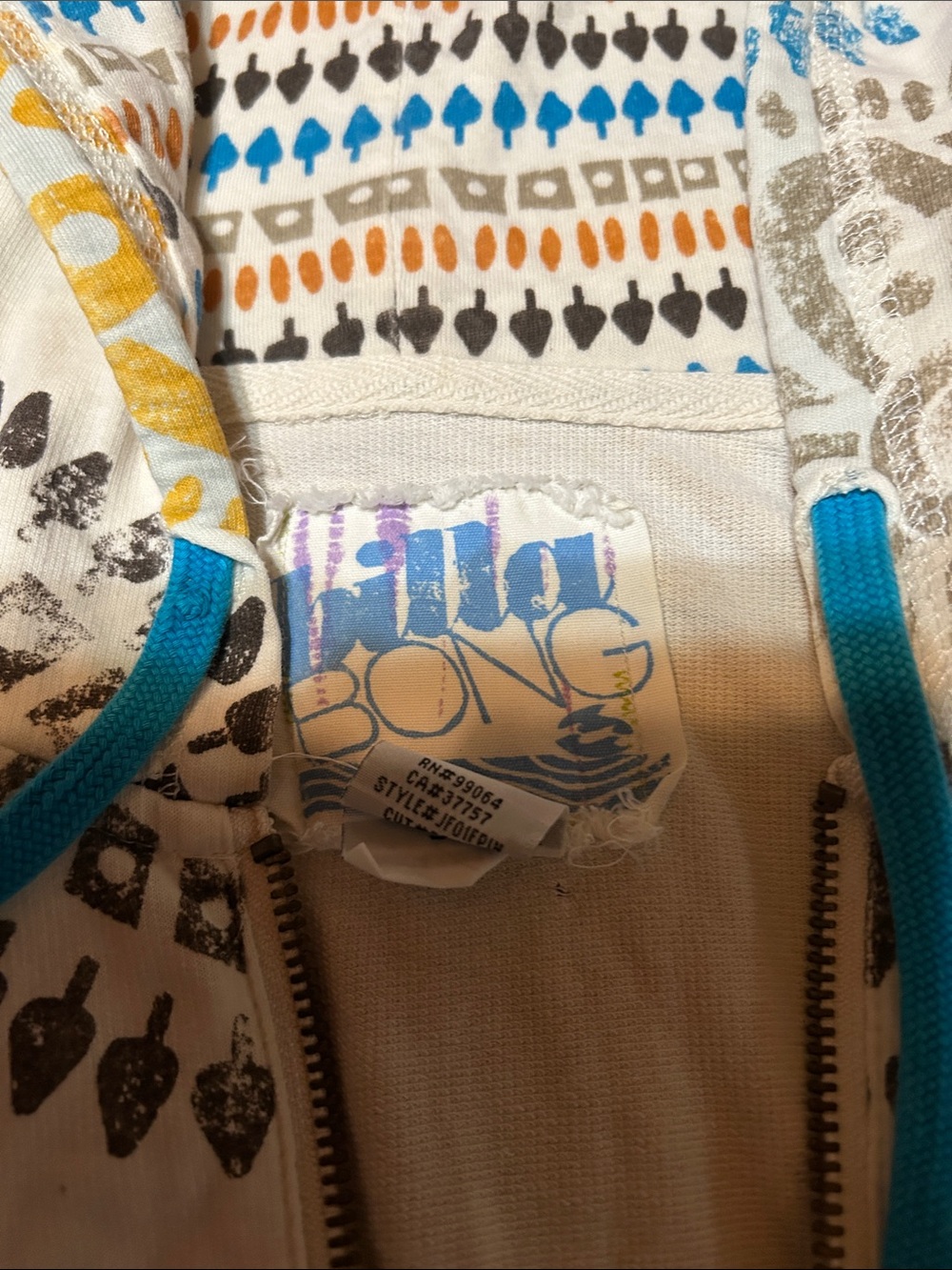 Billabong White Zip Hoodie with Teal Drawstrings and Multicolor Pattern